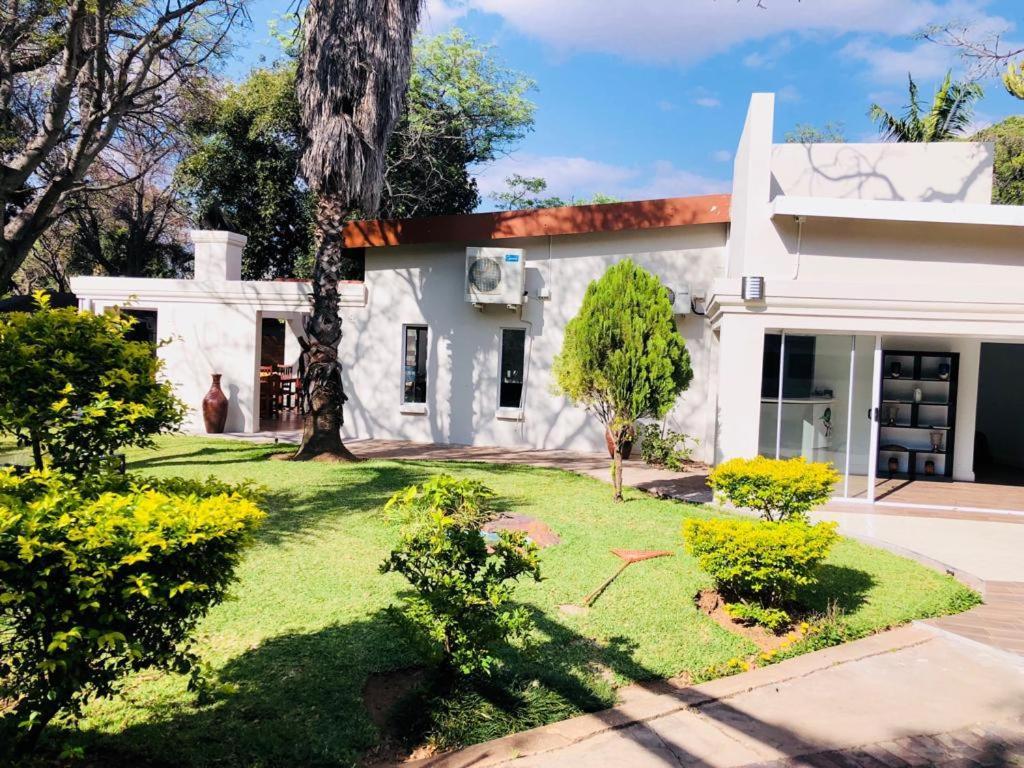 Bosveld Guest House Onverwacht Bagian luar foto